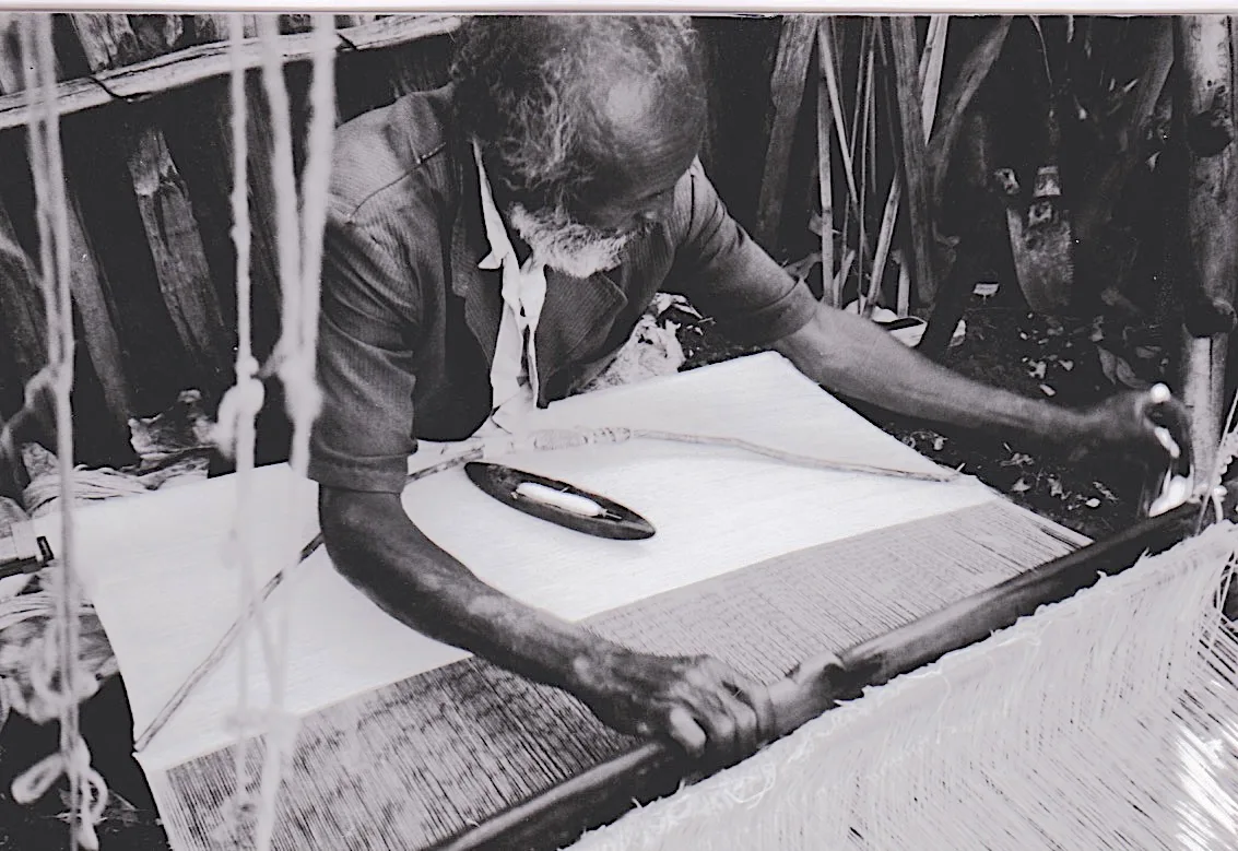 An Ethiopian weaver working at a loom